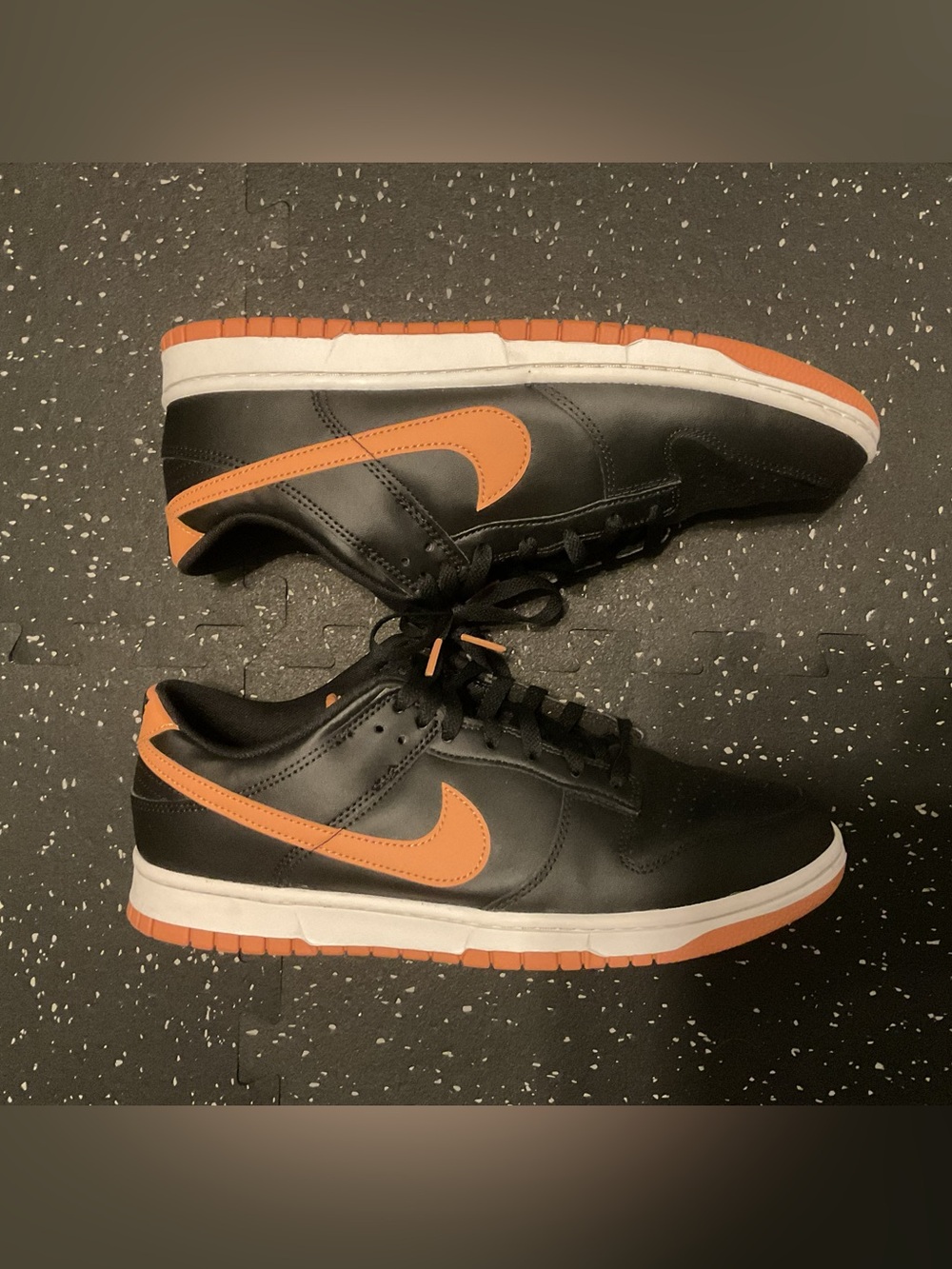Nike Men’s Black and Orange Low-Top Sneakers — Swoosh Detail